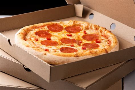 pizza pepperoni salami  open box  tall stack  delivery boxes stock image image