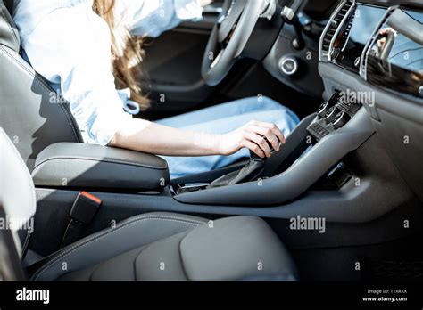 Woman Switching Gear Holding Handle Of The Automatic Gearbox Of The