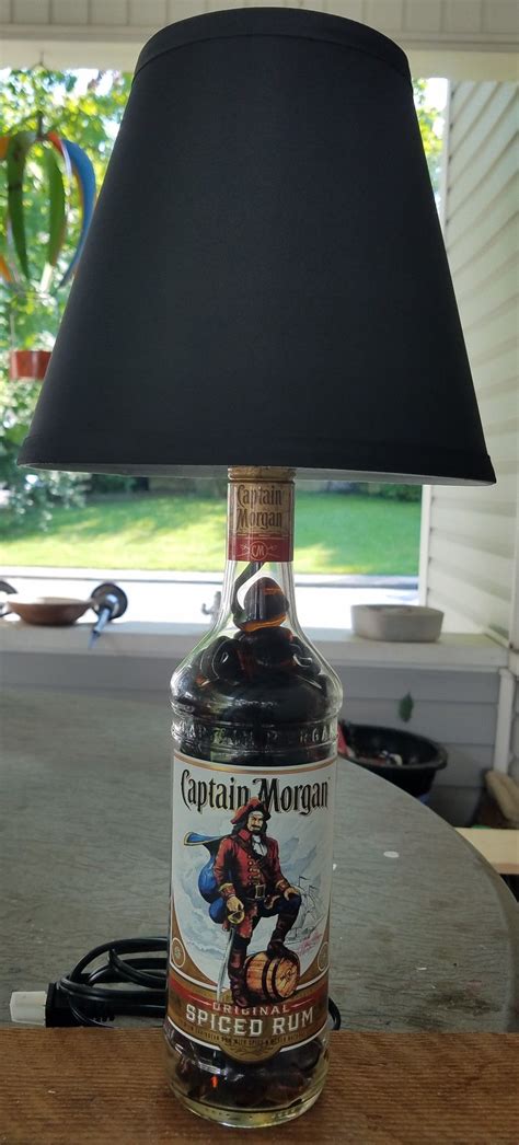 captain morgan rum bottle lamp filled  amber fire glass stones rum bottle bottle lamp