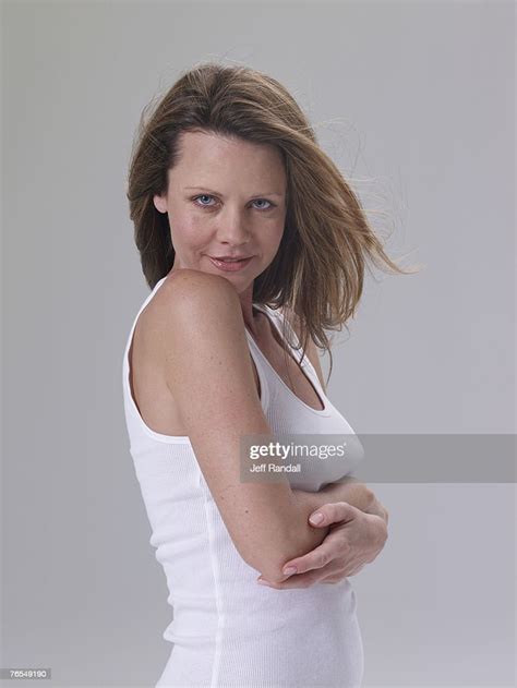 Mature Woman With Brown Hair Smiling Portrait Photo Getty Images