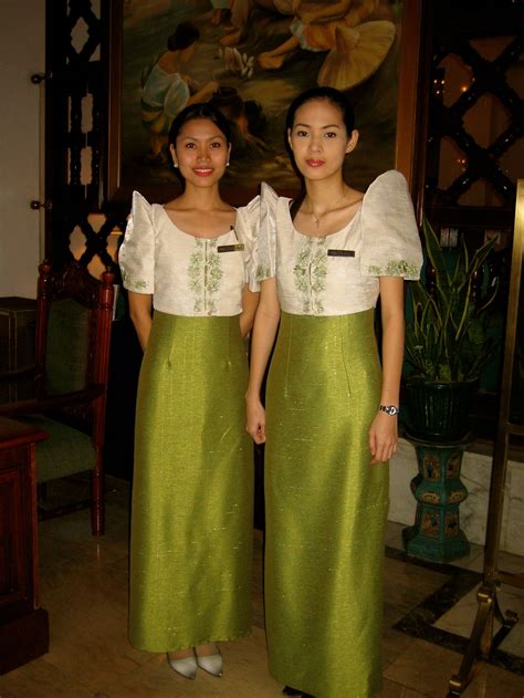 Beautiful Ladies At The Manila Hotel Wearing The Classic Maria Clara