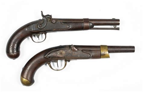 a pair of c1840 single shot percussion pistols