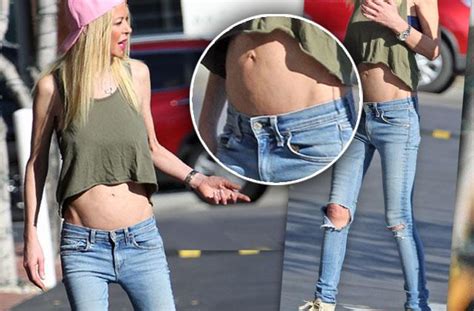 toothpick tara reid shows off bloated belly for new mystery man