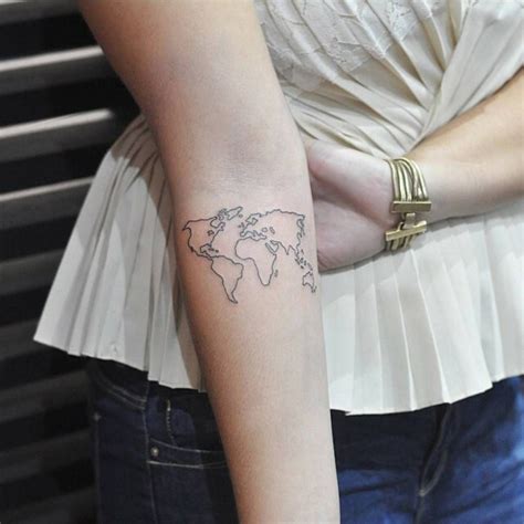 forearm tattoo of the world map by rob green small forearm tattoos