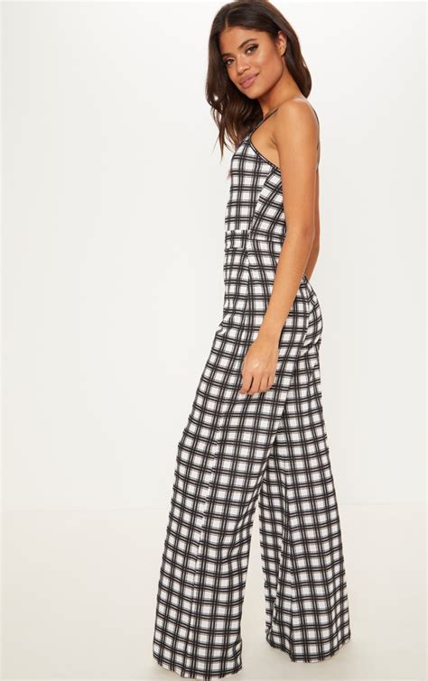 monochrome check o ring belt jumpsuit prettylittlething ie