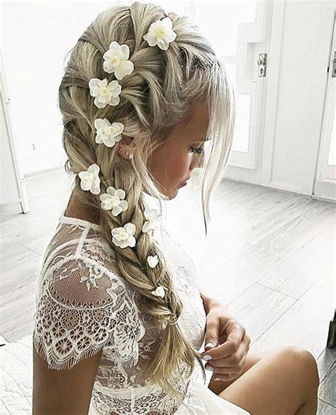 Braided Hair With Beautiful Roses Though The Braid Ideal For A Bridel