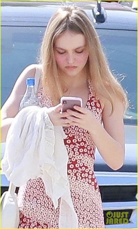 lily rose depp looks pretty in a patterned dress while heading to the