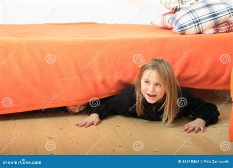 children hiding  bed stock photo image  hide