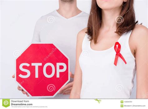 Safe Sex Healthcare Concept Red Ribbon As A Symbol Of