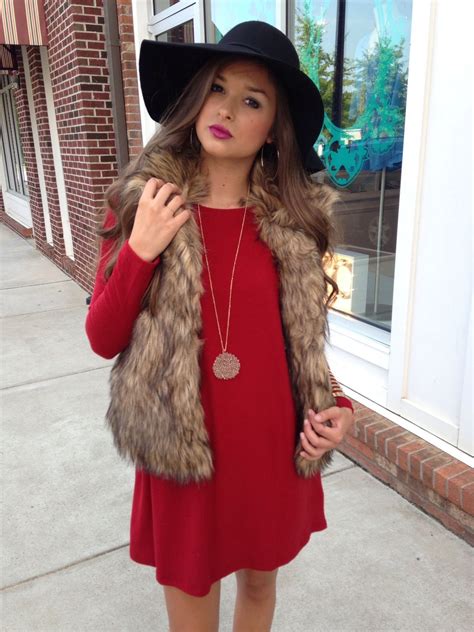 faux fur vest  red dress  cute black hat fashion fur vest outfits style