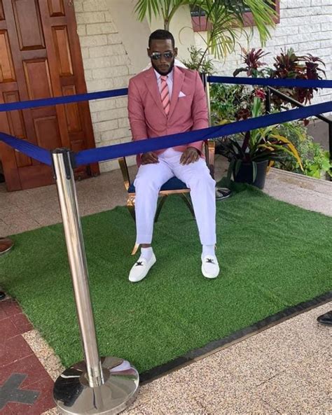 dead man made to sit at his burial in trinidad and tobago photos