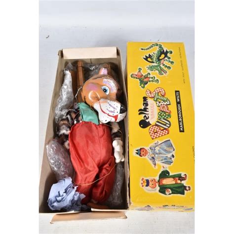 boxed pelham sl tiger puppet version  label  clothing appears complete   good condi