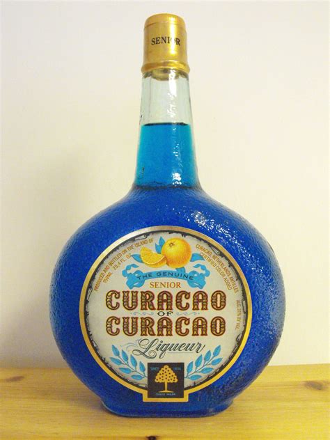 blue curacao curacao azul willemstad caribbean culture caribbean sea whisky bottle vodka