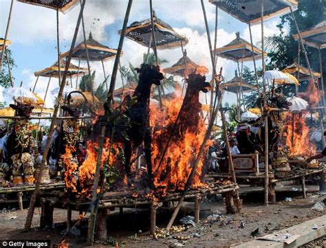 sixty bodies burned in mass cremation in bali daily mail online
