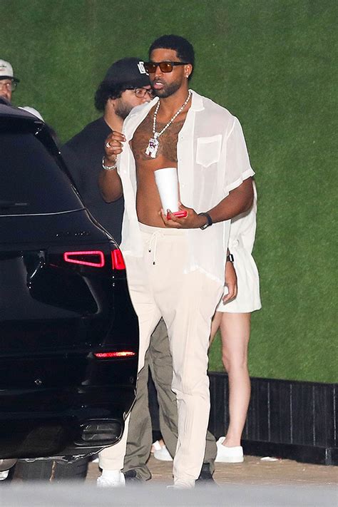 tristan thompson wears unbuttoned white shirt at 4th of july party