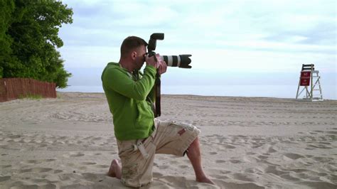 photographer takes photo  sea beach stock footage sbv  storyblocks