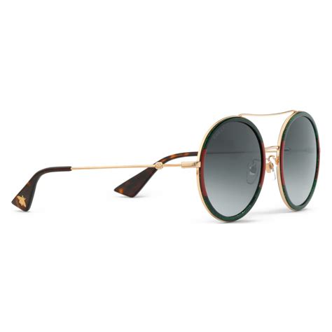 gucci round frame sunglasses black gold gucci eyewear avvenice