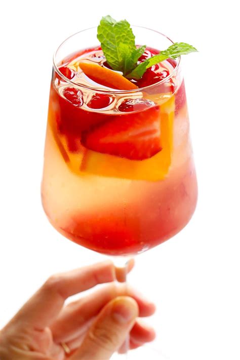 this lovely rosy rosé sangria recipe is made with crisp rosé wine your