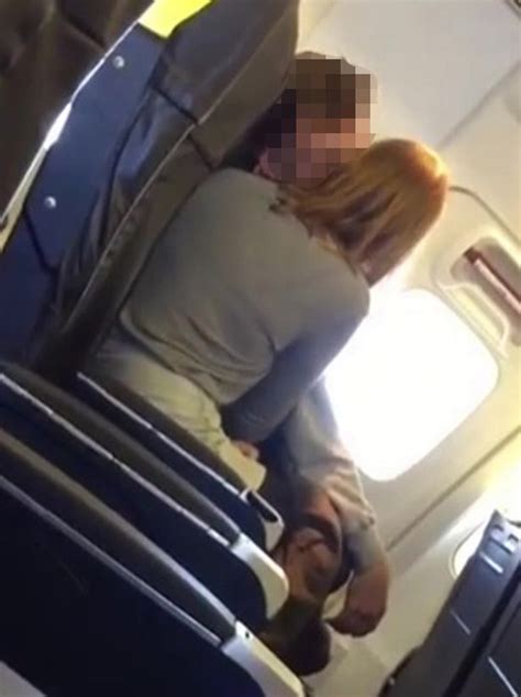 ryanair passenger filmed performing sex act on her lover during flight in front of shocked