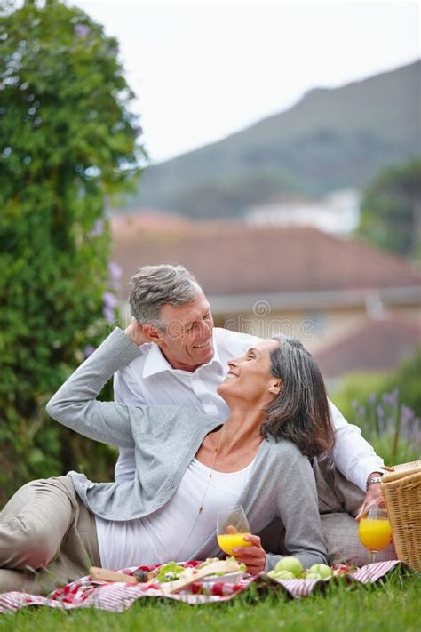 falling in love all over again a loving mature couple having a picnic