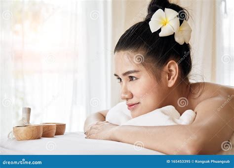 wellness beauty  relaxation concept young asian woman lying  spa