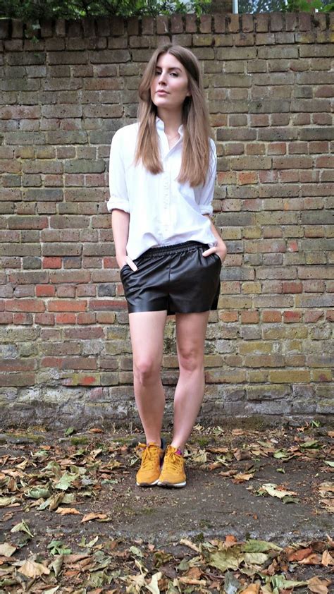 style trunk outfit oversized shirt  leather shorts leather