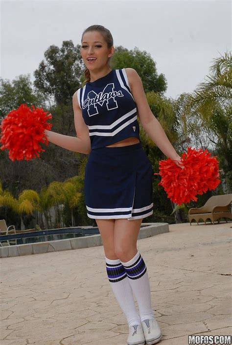 teen cheerleader dani daniels pulls up her skirt to