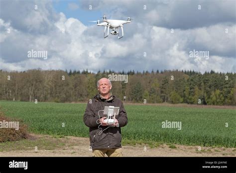 man flying drone stock photo alamy