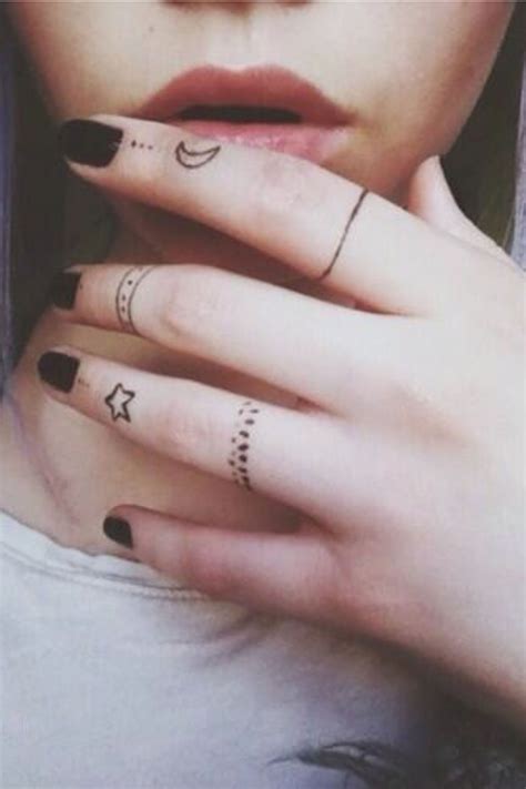 28 Tiny Finger Tattoo Ideas Finger Tattoo Designs Tiny Finger