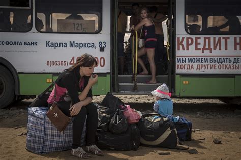 shellshocked ukrainians flee to new lives in russia the new york times