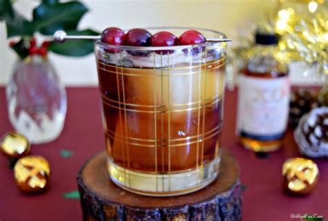 cranberry rum old fashioned with limited edition mount gay