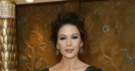 Catherine Zeta Jones Flashes Flesh In Show Stopping Gown Starts At 60