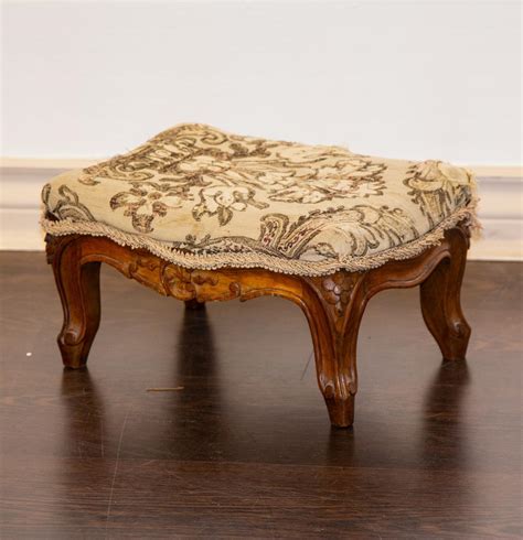 lot  small footstool  upholstered top