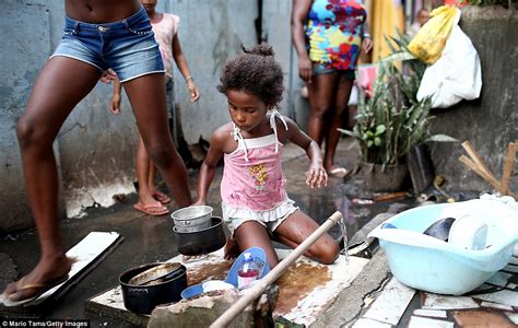 armed police and helicopters in rio slum in clean up ahead of brazil