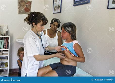 medical examination by paraguayan doctor with a girl editorial image