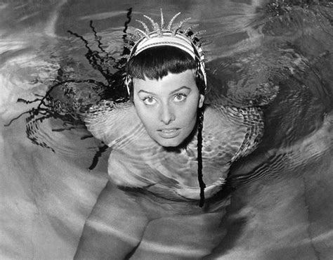 glamorous sophia loren poses in a swimming pool in her bikini in 1954