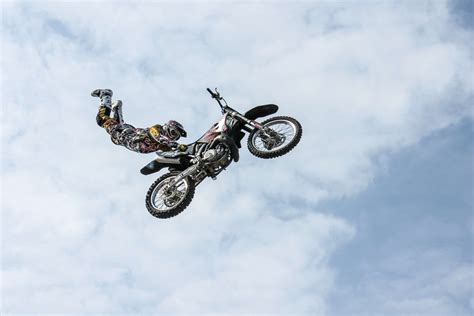 bike biker extreme jump motorbike motorcycle sky sport stunt stuntman  wallpaper