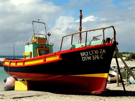 bright  refurbished fishing boat coza flickr