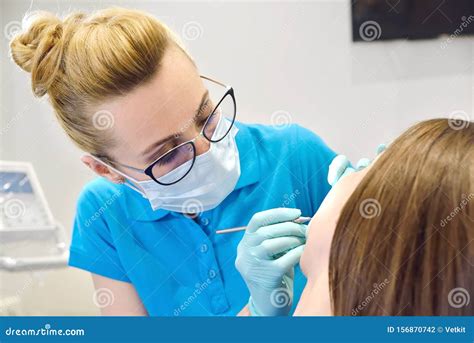 dentist examine patient  braces stock photo image  hospital