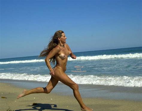 naked girl running on beach october 2002 voyeur web hall of fame