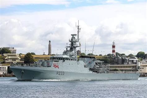 royal navy ship hms tamar firing guns  plymouth sound devon