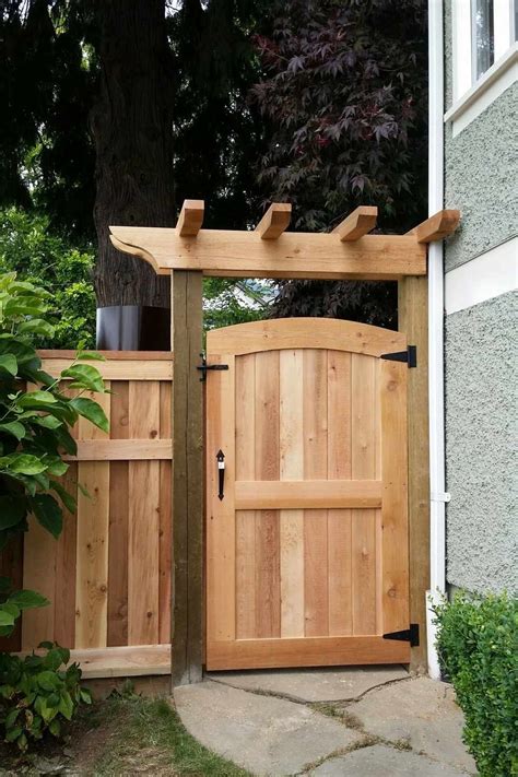 cedar gates arbours custom design  vancouver premium fence company  bc wooden garden