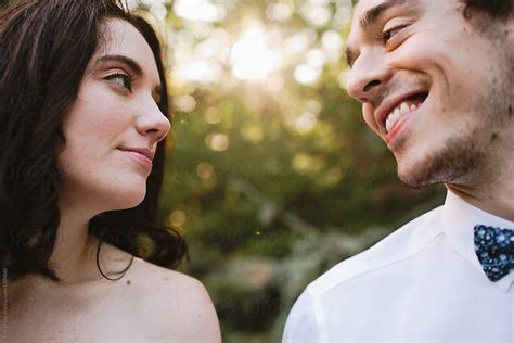 Happy Couple Staring At Each Other By Stocksy Contributor Erin Drago