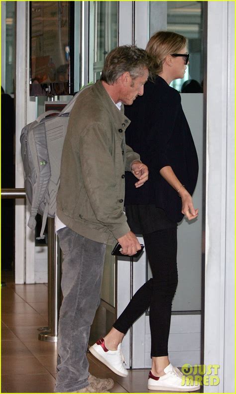 full sized photo of charlize theron sean penn hold hands