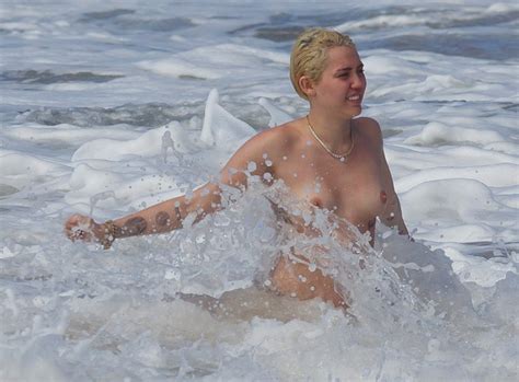 miley cyrus topless on the beach in hawaii 13 celebrity