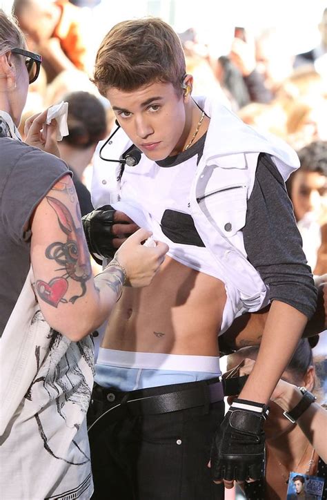justin bieber plays a concert on nbc at rockefeller plaza in new york city and looks quite