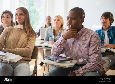 teenage students listening  classroom stock photo alamy