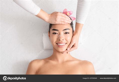 Relaxing Massage Beautiful Asian Woman Enjoying Beauty Treatments At