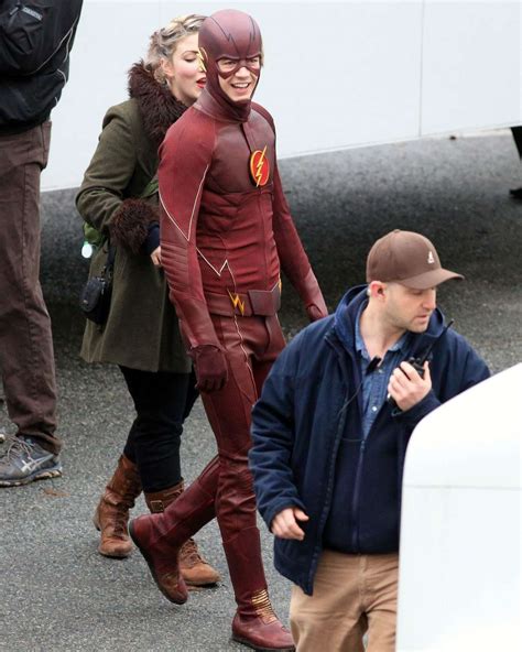 grant gustin and candice patton share a kiss on the flash set 12