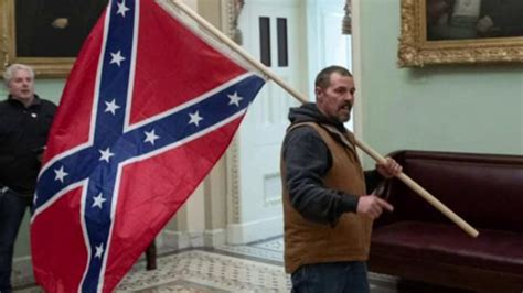 Man Holding Confederate Flag In Capitol During Pro Trump Riot Turns